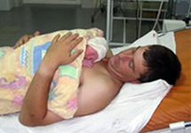 View details: Father keeps newborn warm to prevent hypothermia in Ukraine View details: Father keeps newborn warm to prevent hypothermia in Ukraine